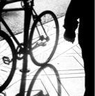 Bicycle_Man walks by_Excellent B&W.jpg